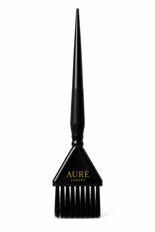 Black hairbrush with 'Aure' logo on a white background