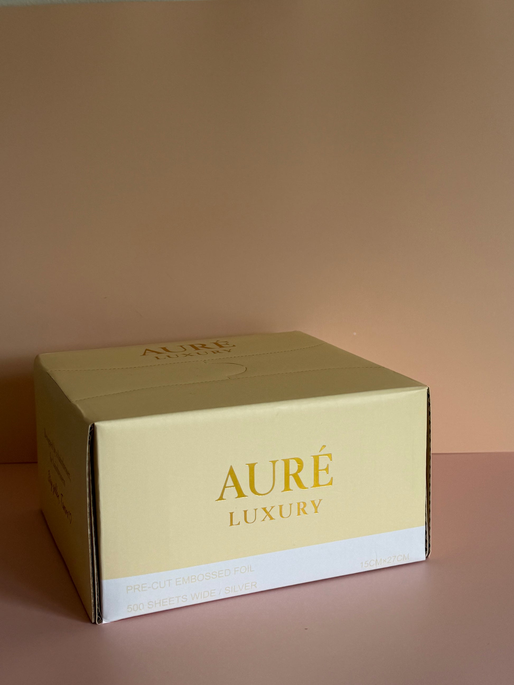 Aure Luxury box on a beige background